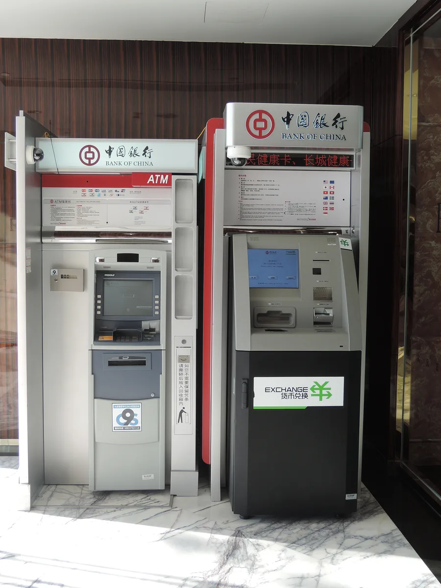 A Bank of China ATM beside a currency exchange machine in Shanghai