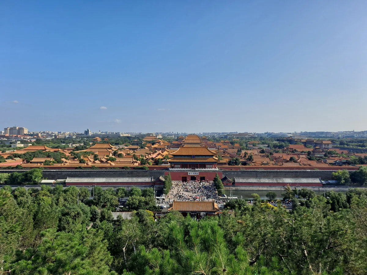 Yellow palace roofs of the Forbidden City seen from Jingshan Park in Beijing