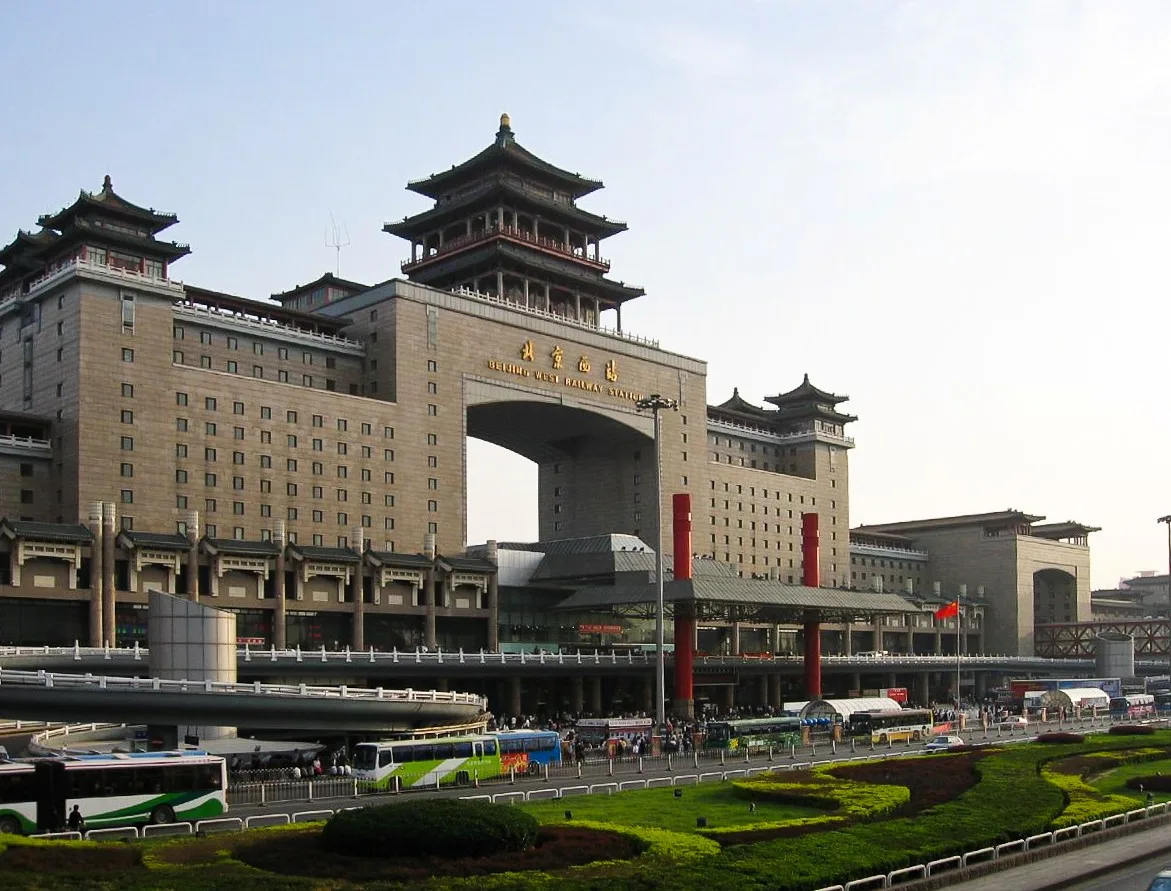 The exterior of Beijing West Railway Station, with the station name in Chinese and English