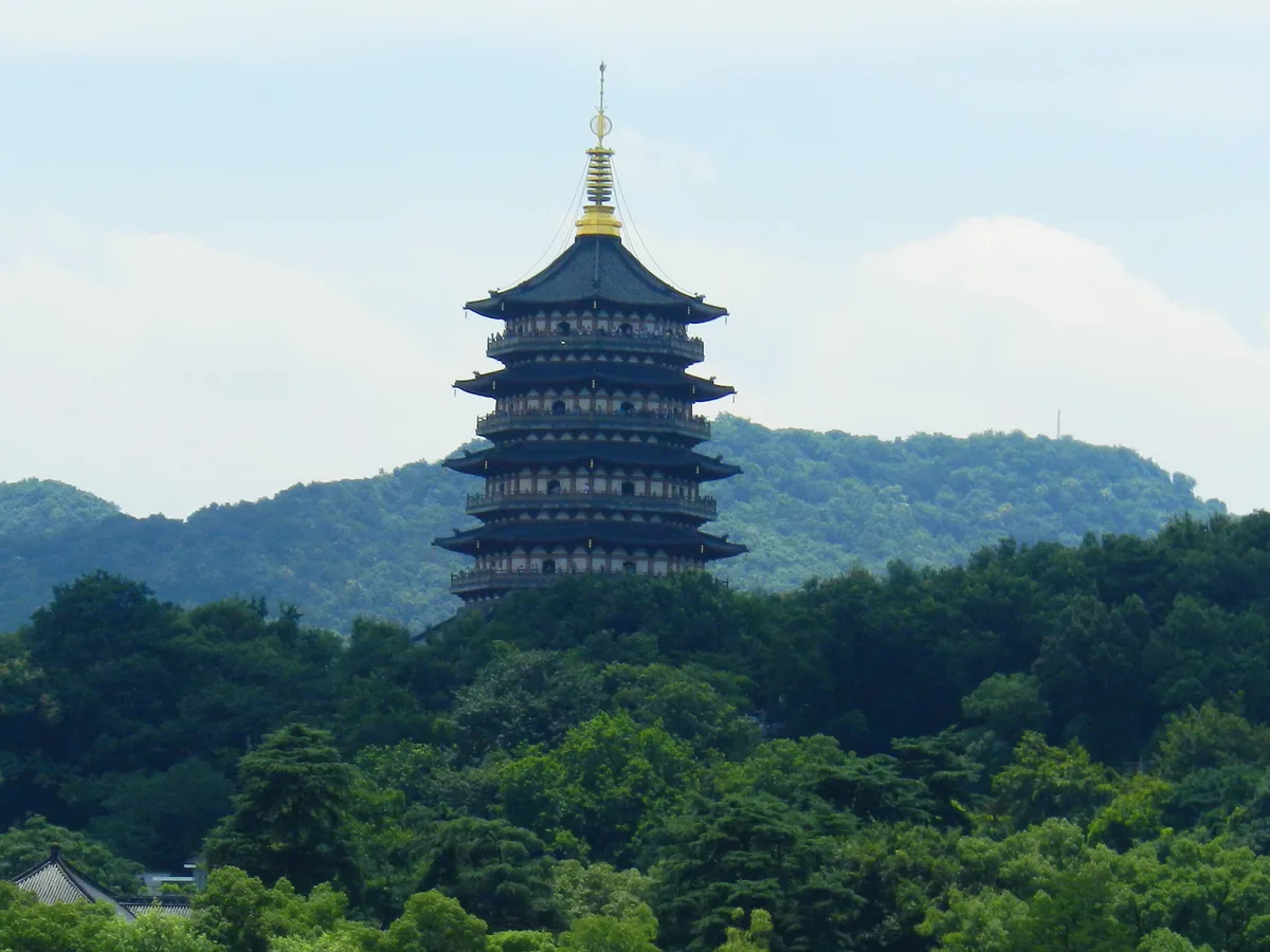 Leifeng Pagoda rising above trees on the south side of West Lake in Hangzhou