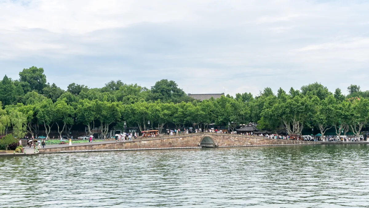 The arched stone Broken Bridge crossing West Lake in Hangzhou